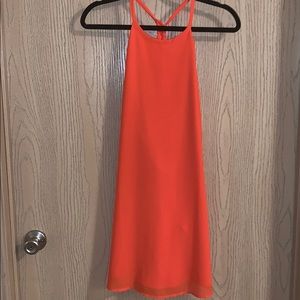 bright orange dress with cute braid detail on back